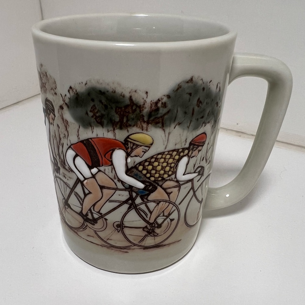 Cyclist drinking mug